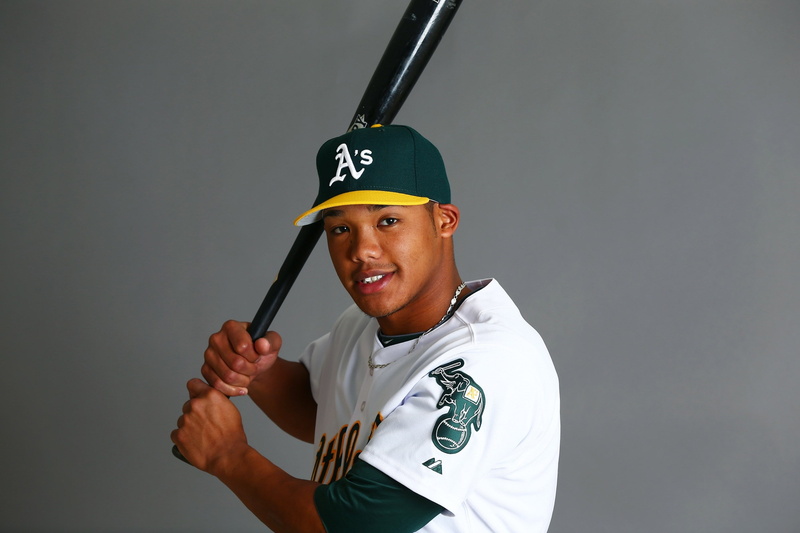 2K, gray background, addison russell, uniform, waist up, occupation, holding, one person, emotion, looking at camera, gray, standing, indoors, portrait