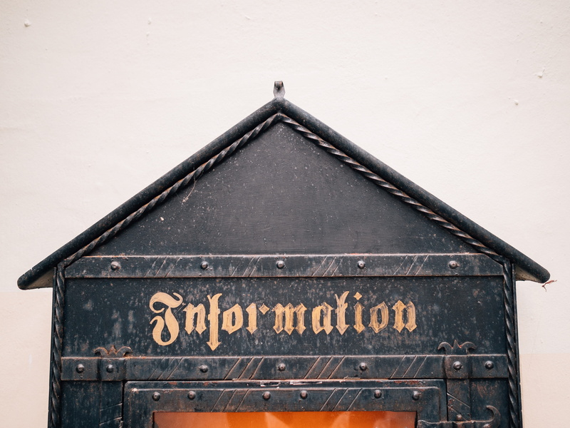 wood - material, letter, building exterior, white background, shape, signage, day, communication, black, built structure, western script, text, no people