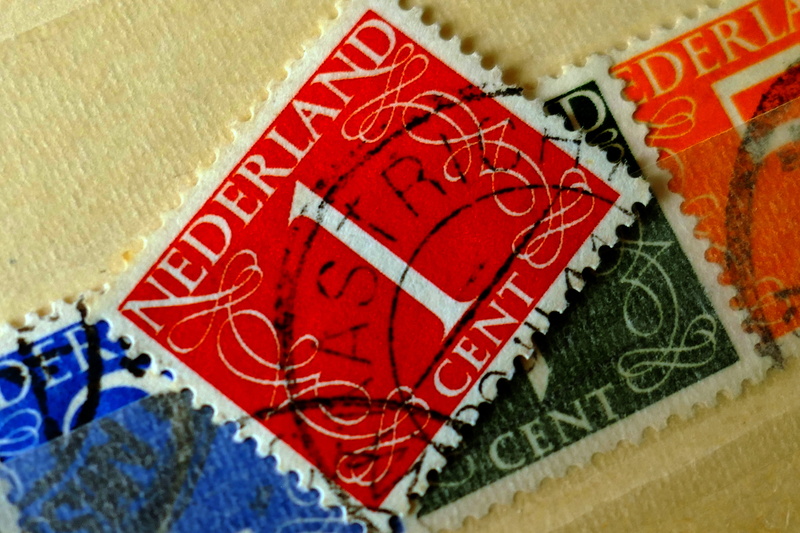 postage stamp, architecture, pattern, 5K, value brands, vintage, letters, indoors, franking, close-up, group of objects, collection, full frame, high angle view