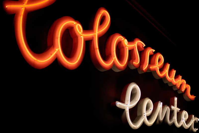 colosseum center, nightlife, red, new years eve, cinema, sign, studio shot, communication, neon tube, no people, 5K, text, indoors, illuminated, neon colored