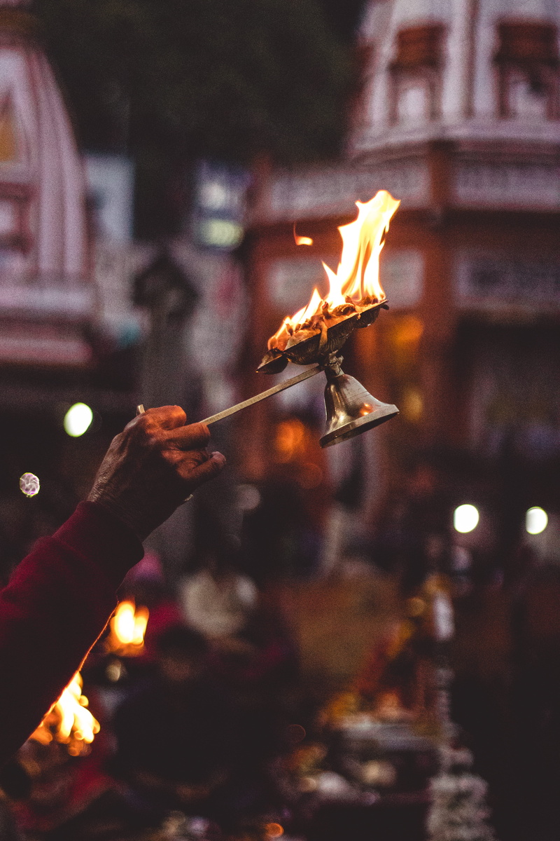 holding, celebration, real people, finger, burnt, heat - temperature, focus on foreground, heat, human hand, 5K, person, lights, glowing, lifestyles, hot