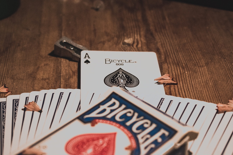cards, representation, art and craft, still life, 5K, ace of spades, playing cards, ace, western script, table, indoors, wood - material, bicycle, arts culture and entertainment