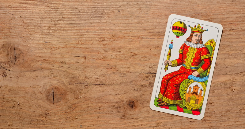 directly above, diamonds, no people, desk, card, multi colored, wood - material, creativity, art and craft, representation, playing card, table, human representation
