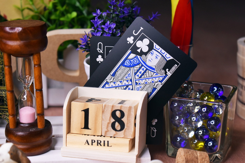 texas poker, box, jack, candle, jack queen, number, 5K, container, no people, publication, box - container, text, table, cards, flowering plant, indoors