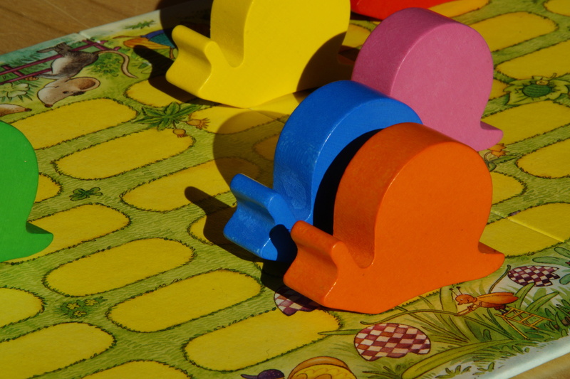 blue, snail race, high angle view, 5K, indoors, creativity, snail, vibrant color, children, still life, close-up, pattern, game rules, multi colored, snails