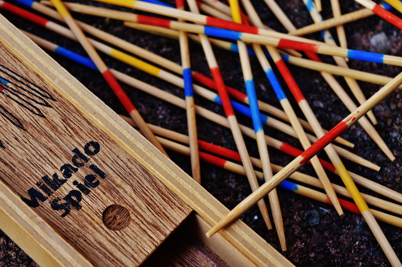 high angle view, writing instrument, puzzle, brown, leisure games, pastime, colorful, focus on foreground, wood, wooden sticks, selective focus, still life