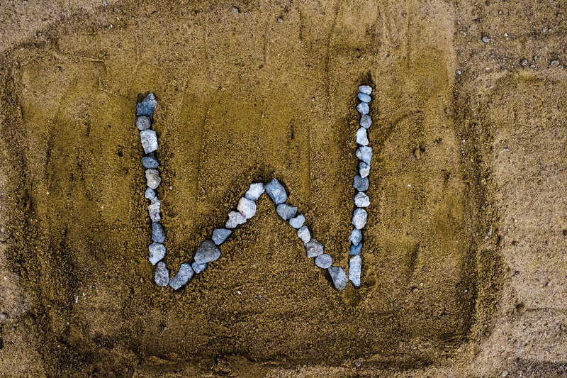 english alphabet, built structure, alphabet letters, 5K, directly above, pattern, architecture, close-up, wall, no people, alphabet, w, alphabetic character