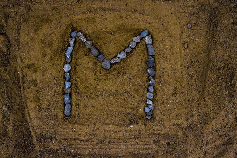 alphabet, chain, alphabet letters, communication, text, positive emotion, personal accessory, alphabetic character, directly above, metal, alphabet m, high angle view