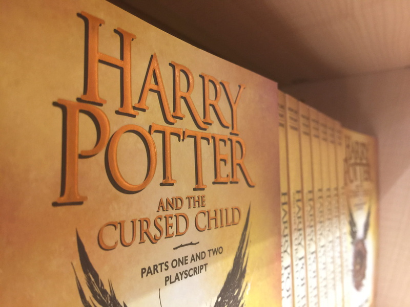 illuminated, text, architecture, cursed child, communication, store, wall - building feature, bathroom, indoors, information sign, low angle view, radcliffe