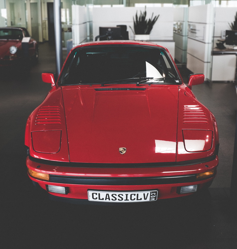 motor vehicle, city, transportation, united states, wealth, vintage, gaudin porsche lv, no people, street, architecture, communication, fast, red, stationary