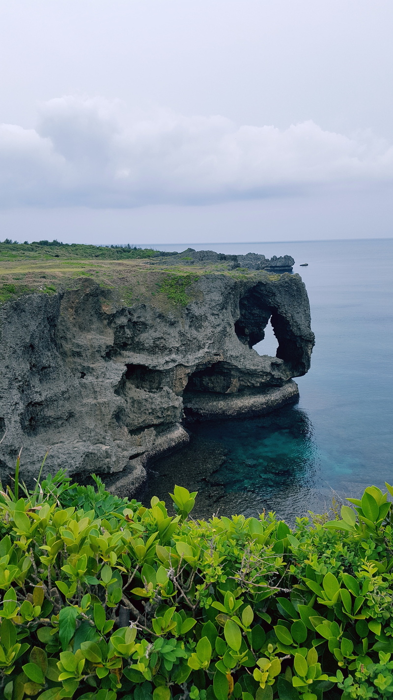 sky, tranquility, plant, landscape, nature, rock, scenics - nature, water, cliff, land, okinawa prefecture, scenics, tranquil scene, no people, day, solid