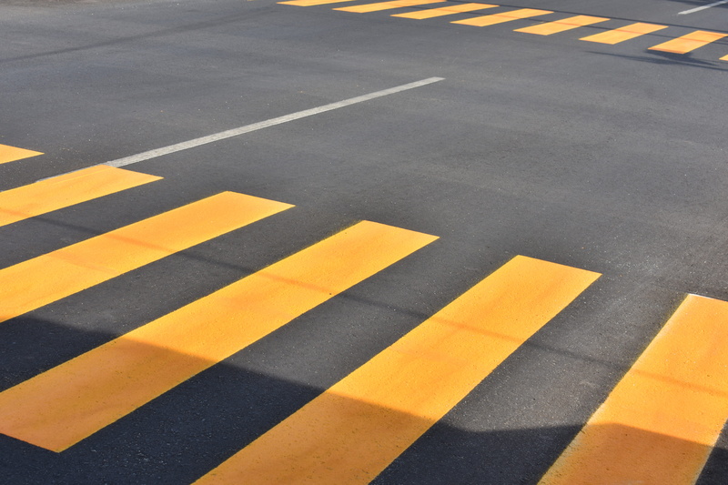 hermosillo, intersection, sign, sonora, road, tarmac, juice, safety, yellow, drink, road marking, city, symbol, day, roadway, beverage, high angle view