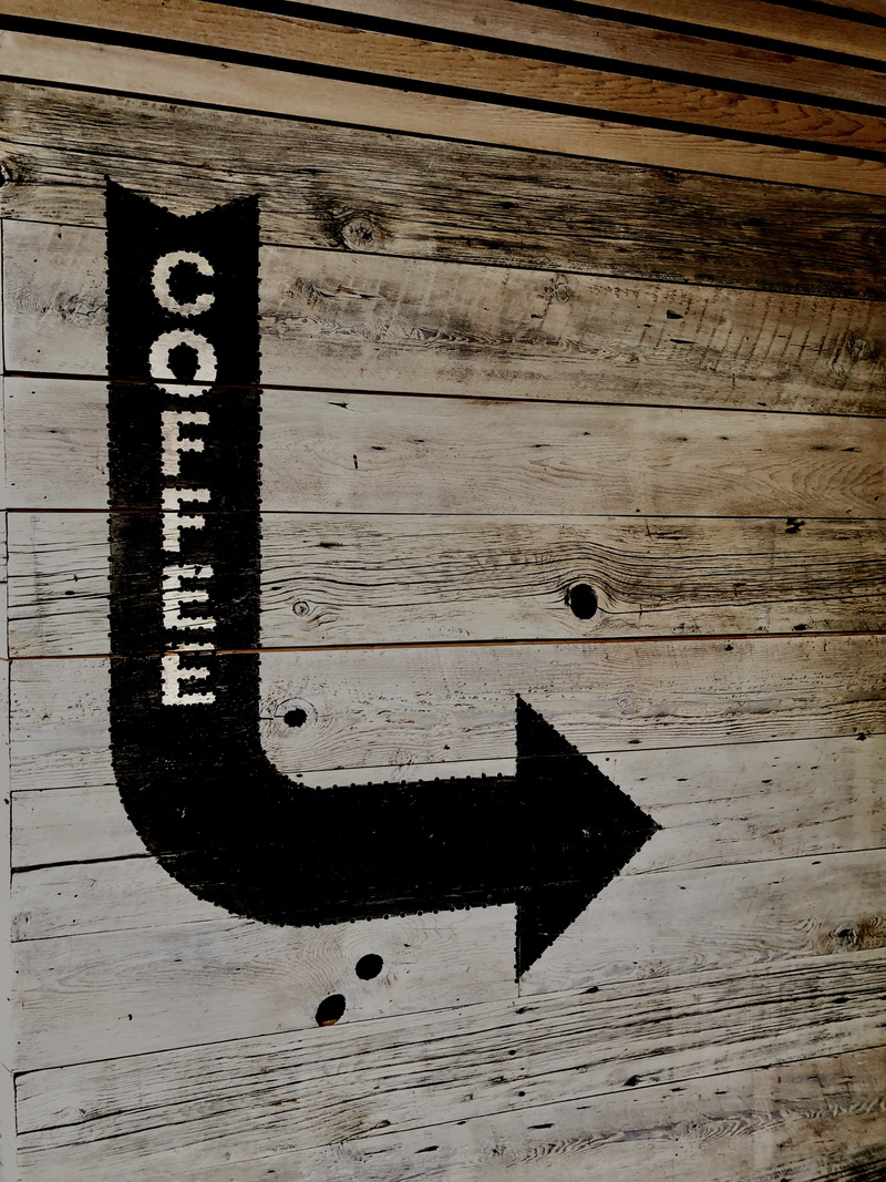 text, western script, no people, full frame, number, communication, wall - building feature, signage, sign, wooden wall, metal, arrow, 4K, outdoors, coffee shop
