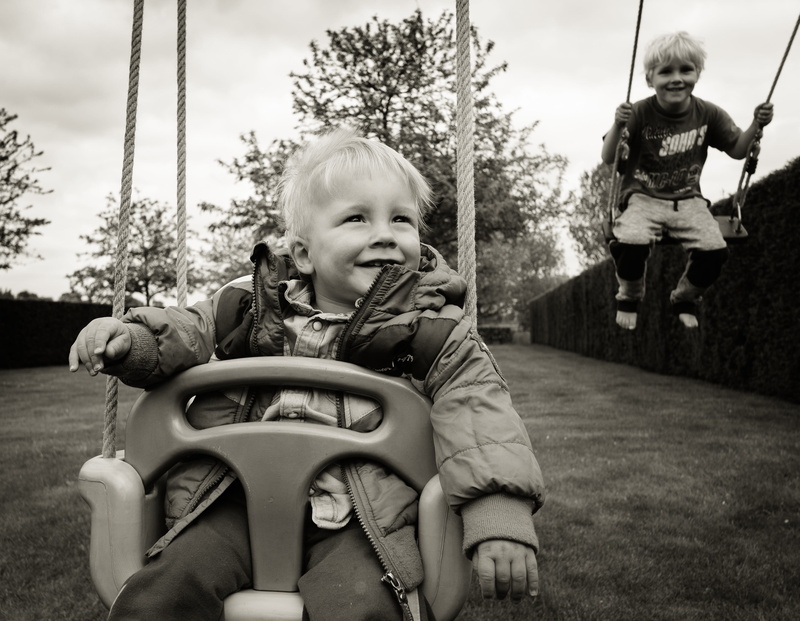 plant, lifestyle, swing, chairs, riding, full length, nature, kids playing, nursery, day, playground, kids, men, activity, park, two, happy, happy kid