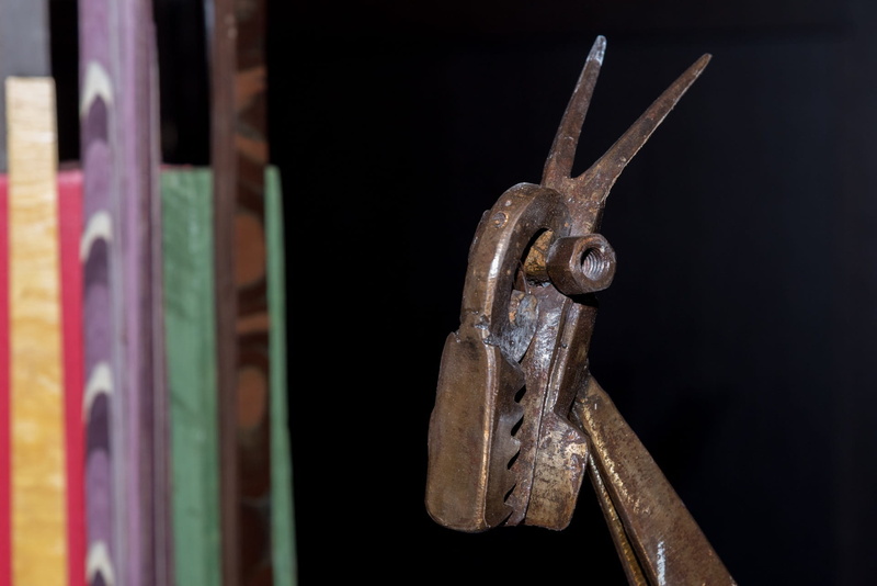 door, machine part, Welding, entrance, selective focus, quadruped, Sculpture, one animal, machinery, 1080P, indoors, Artwork, rusty, flock, Goats, metal