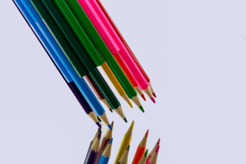 group of objects, colorful, wooden pegs, mirroring, art and craft equipment, cross, creativity, white background, multi coloured, green color, in a row