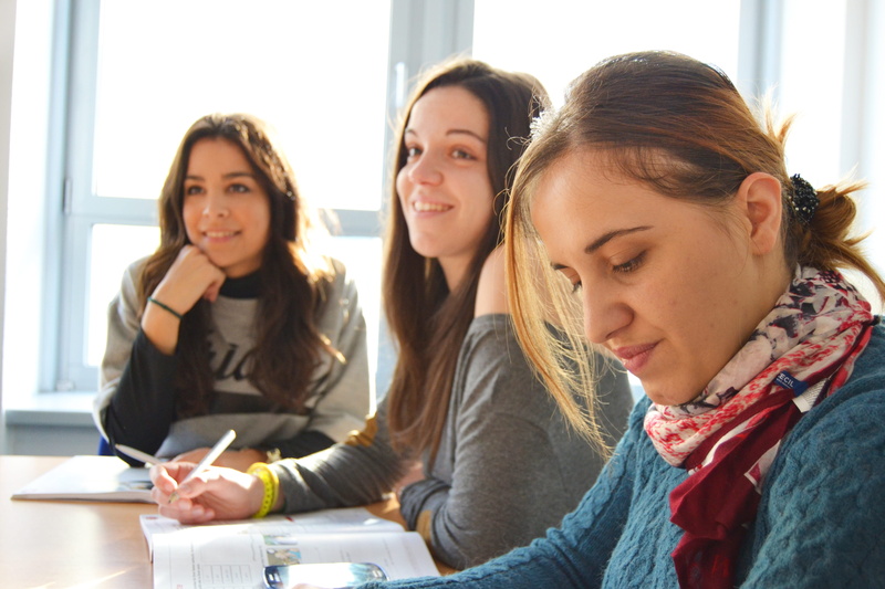 language school, education, books, teenage girls, teenager, pen, 4K, holding, student, friendship, indoors, table, child, people, young adult, team, school