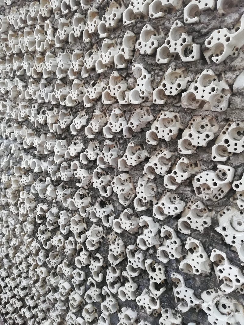 face, rug, repetition, creativity, backgrounds, tar, built structure, design, child, textured, waste, texture, outdoors, 4K, white color, hole, no people