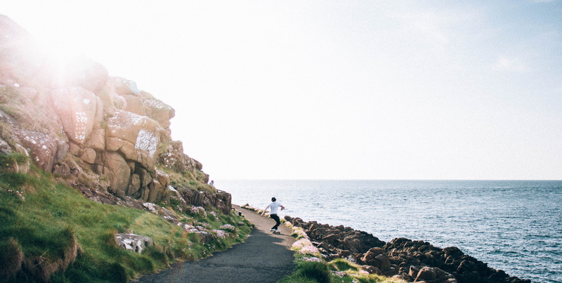 nature, horizon over water, gass, beach, lifestyles, scenics - nature, green, coast, guy, solid, water, tranquil scene, scenics, rock - object, travel