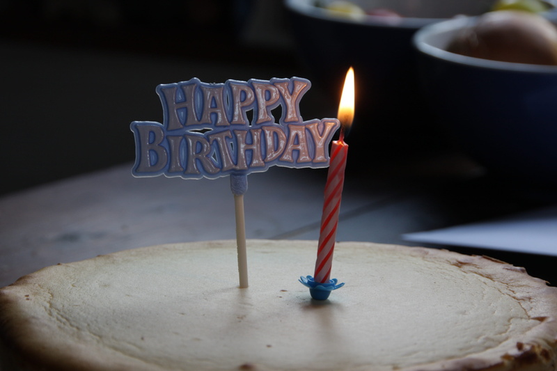 focus on foreground, dessert, food and drink, kuchendeko, table, congratulations, sweet food, cheesecake, 4K, fire, no people, birthday, fire - natural phenomenon