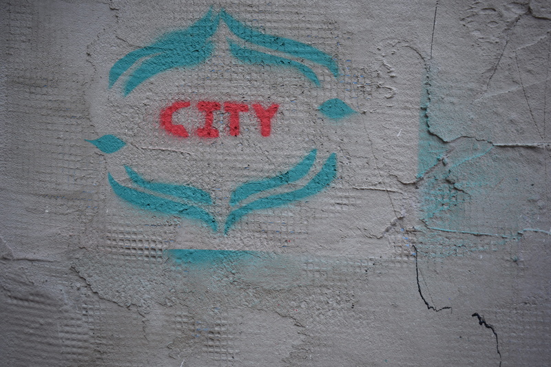 city, applique, hand, no people, art, western script, message, concrete, close-up, day, tarmac, 5K, bag, heart shape, text, graffiti, outdoors, stain