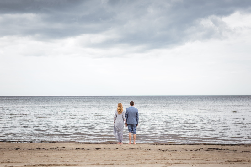 full length, romance, blue, togetherness, nature, standing, horizon over water, holding hand, sky, two people, men, heterosexual couple, adult, grey, cloud - sky