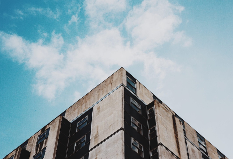 worm, corner, day, nature, reflection, beige, black, city, concrete, sunlight, building, outdoors, glass - material, building exterior, high section, brown