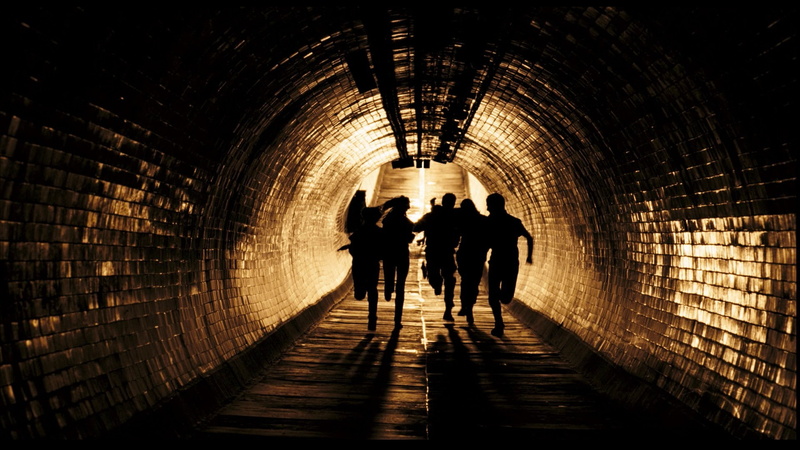 adult, women, walking, ceiling, architecture, illuminated, group of people, underpass, movies 28 weeks later, arch, silhouette, men, people, tunnel, footpath