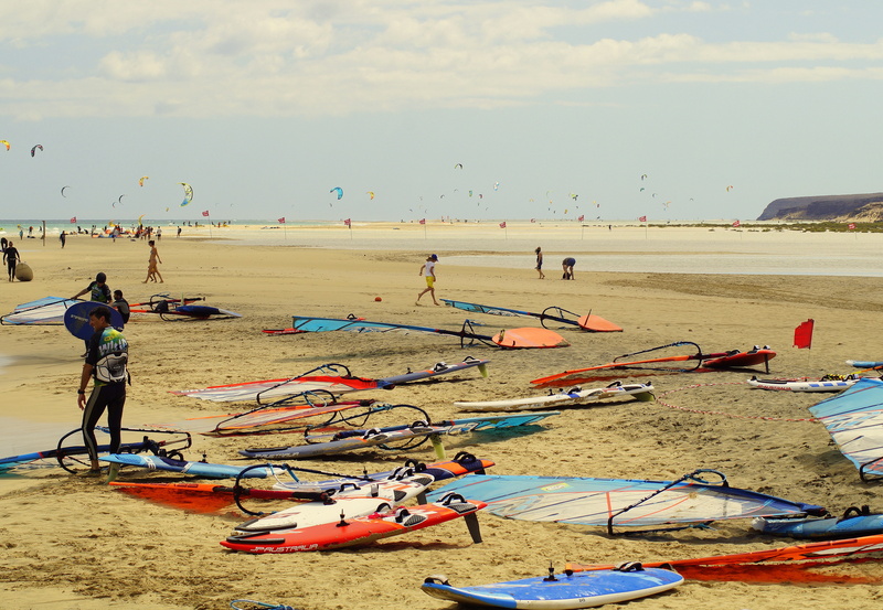 leisure, dom, relaxation, holidays, lifestyles, fuerteventura, adventure, beach, group of people, beauty in nature, sand, summer, ocean, sport, fun, surfboard