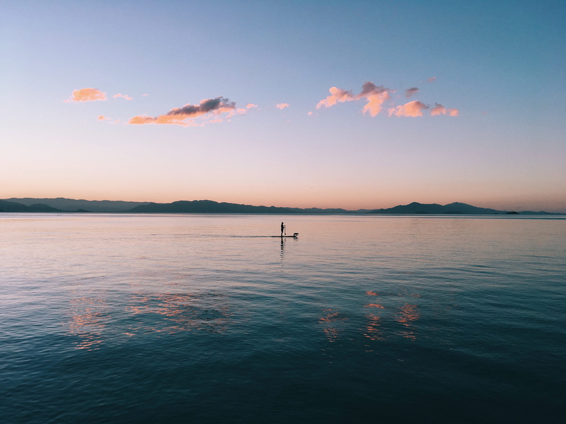 landscape, water, stick, beauty in nature, cloud - sky, nature, scenics - nature, silhouette, body, standing, body of water, orange color, reflection, color Image