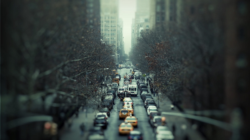 mode of transportation, bokeh, land vehicle, snow, architecture, selective focus, nyc, building, the high line, blur, nature, walkway, motor vehicle, selective