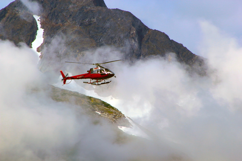 outdoors, foggy, aviate, transportation, rock, vehicle, flying, travel, daylight, winter, cold, solid, flight, fog, day, mode of transportation, people