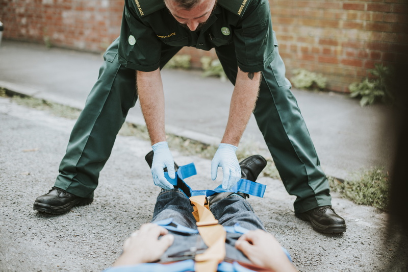 injured, street, human leg, city, uniform, human foot, equipment, suit, real people, 8K, people, man, medical, wear, men, wearing, leisure activity, shoe