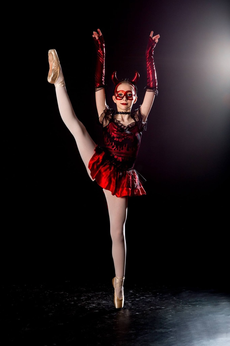 dancing, fashion, wearing, dance, portrait, human arm, indoors, human limb, stage, hairstyle, women, mask, black background, devil, female, ballet, girl