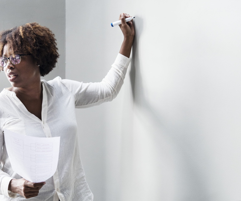 white wall, young, training, adult, workshop, teacher, shirt, trainer, wall, wearing, woman, women, person, office, writing, board, casual clothing, standing