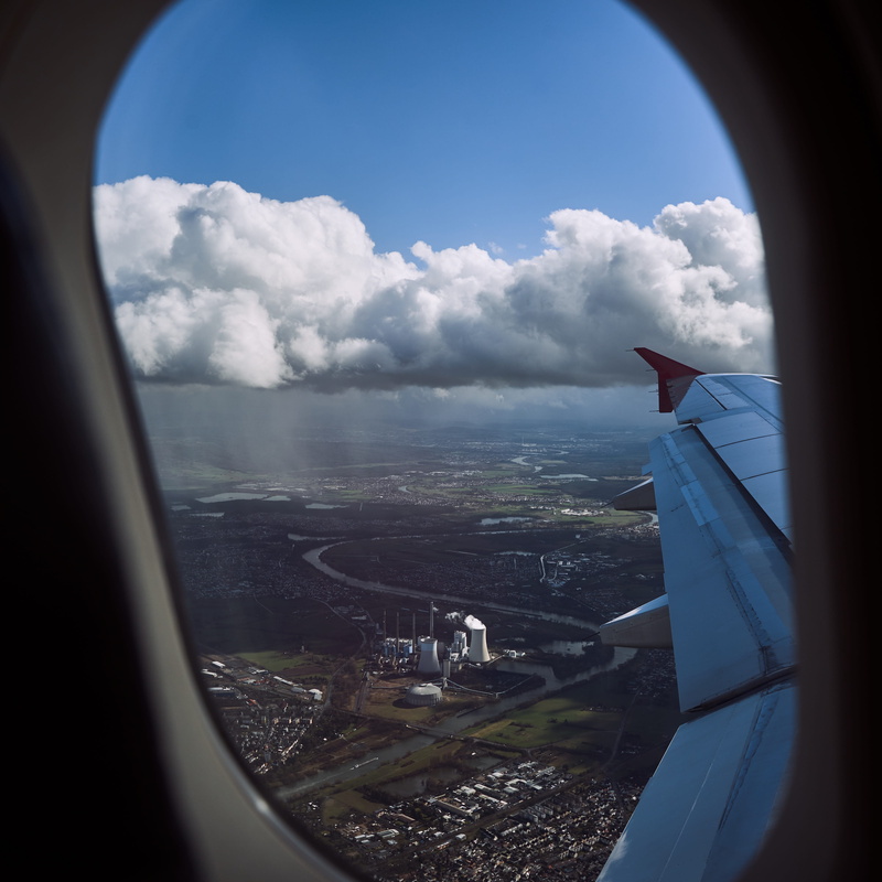cloud - sky, lighting, wing, main, aircraft, landscape, travel, outdoors, sky, air, city, aviation, mode of transportation, aircraft wing, day, building exterior