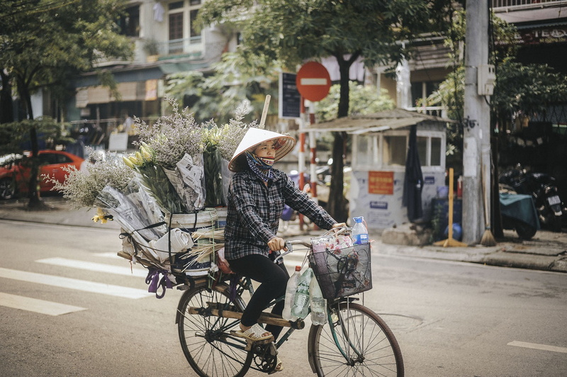 flowers, biker, real people, architecture, road, casual clothing, cyclist, woman, street, ride, adult, bike, outdoors, mode of transportation, 4K, day