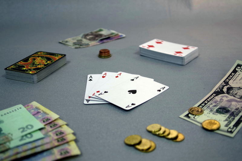 gambling, game of chance, bridge, coin, still life, relaxation, playing cards, table, poker, indoors, win, happiness, gaming, poker - card game, waist